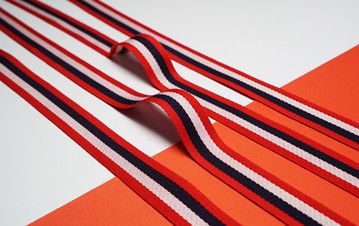 How to identify the webbing material produced by the webbing manufacturer?